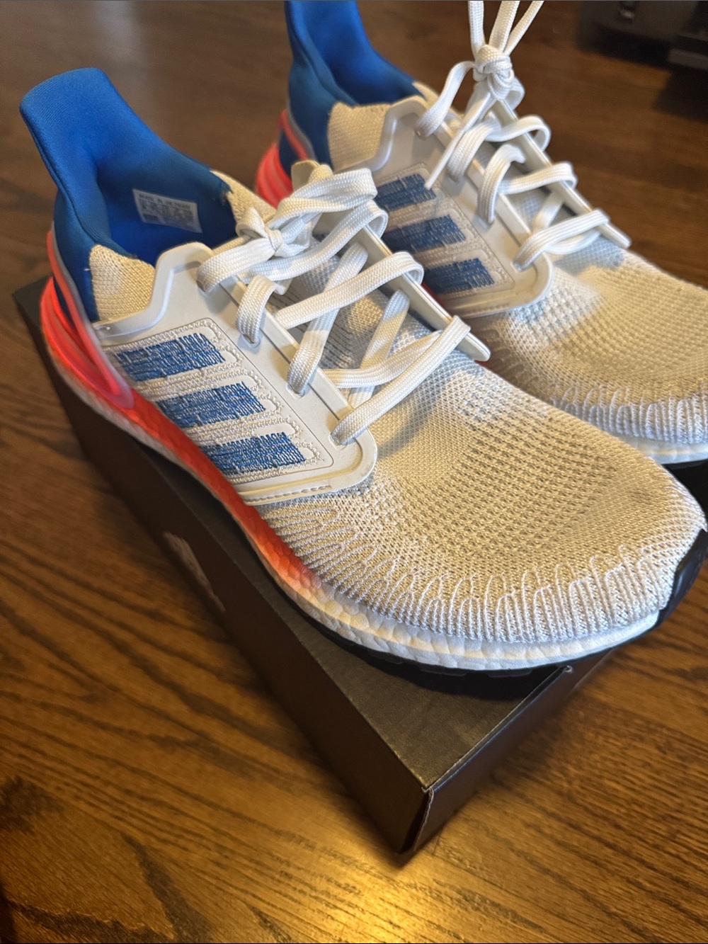 Adidas Ultraboost Primeblue Whitw, blue, orange.